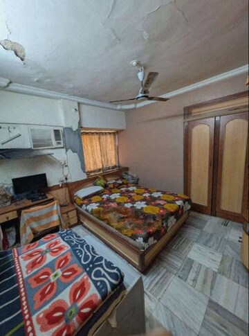 Bedroom in 2 BHK Apartment at Kalpataru Paramount, Kapur Bawdi – for Rent