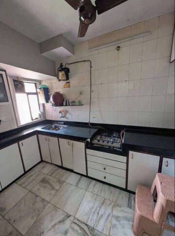 Kitchen in 2 BHK Apartment at Kalpataru Paramount, Kapur Bawdi – for Rent
