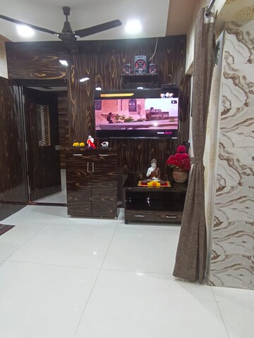 Living Room in 1 BHK Apartment at RNA NG Canary, Mira Road – for Rent