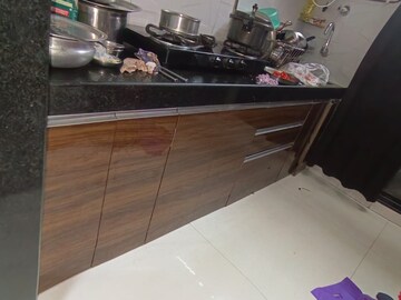 Kitchen in 1 BHK Apartment at RNA NG Canary, Mira Road – for Rent