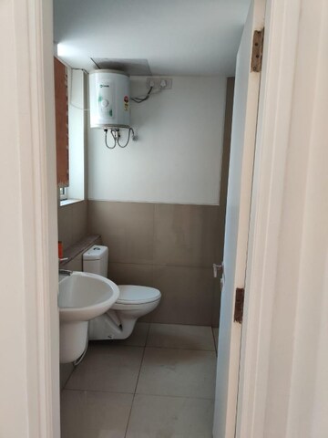 Bathroom in 3.5 BHK Apartment at Emaar Palm Gardens, Sector 83 – for Sale