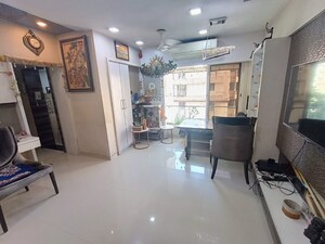 Living Room in 2 BHK Apartment at Malad West – for Sale
