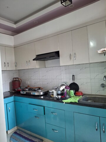 Kitchen in 2 BHK Apartment at Eureka Diya Green City, Raj Nagar Extension – for Sale