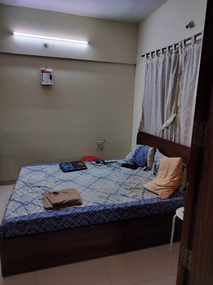 Bedroom, magarpatta-city-zinnia 1 Bedroom 580 Sq.Ft. Apartment In Hadapsar Pune 8594796