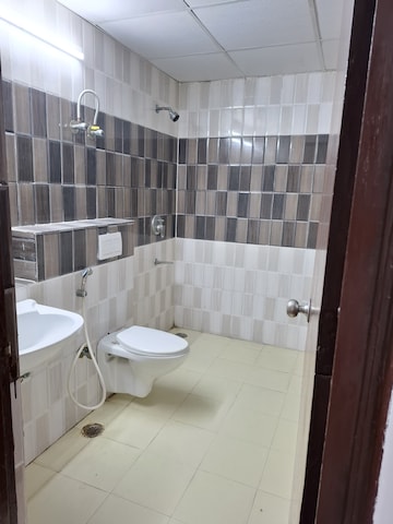 Bathroom in 3 BHK Apartment at Unnati Fortune The Aranya, Sector 119 – for Rent