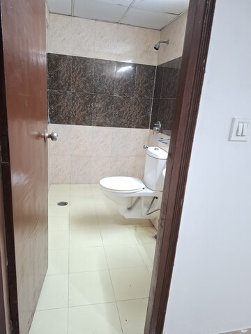 Bathroom in 3 BHK Apartment at Unnati Fortune The Aranya, Sector 119 – for Rent