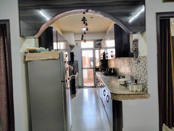 Kitchen in 2 BHK Apartment at Supertech Czar Suites, Omicron I Greater Noida – for Sale