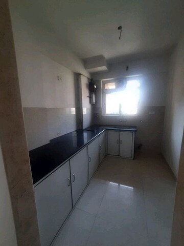 Kitchen in 2 BHK Apartment at Hiranandani Villa Grand, Ghodbunder Road – for Rent