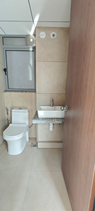 Bathroom in 1 BHK Apartment at Kalpataru Immensa, Kolshet Road – for Sale