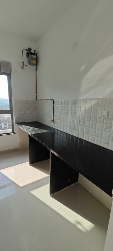 Kitchen in 1 BHK Apartment at Kalpataru Immensa, Kolshet Road – for Sale