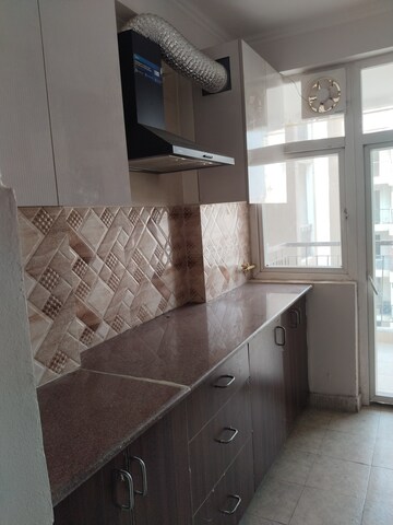 Kitchen in 3 BHK Apartment at Amrapali Leisure Park, Amrapali Leisure Valley – for Rent