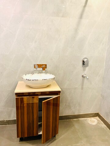 Bathroom in 4 BHK Builder Floor at Green Fields Colony – for Rent