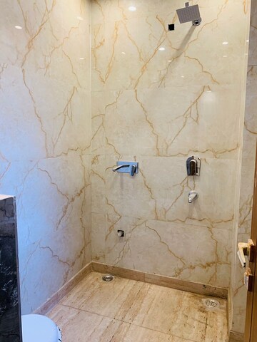 Bathroom in 4 BHK Builder Floor at Green Fields Colony – for Rent