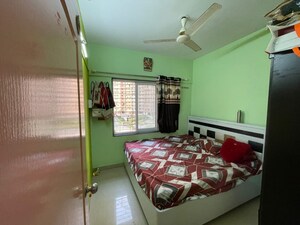 Bedroom in 2 BHK Apartment at Shapoorji Pallonji Sarova, Kandivali East – for Sale