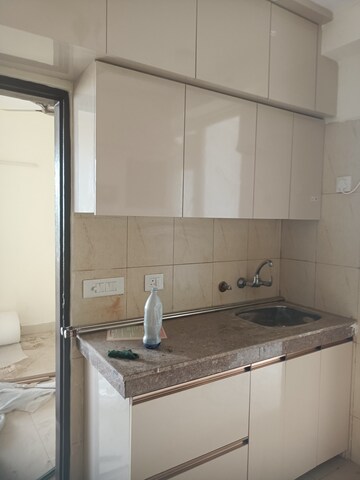 Kitchen in 3 BHK Apartment at Lotus Panache, Sector 110 – for Rent