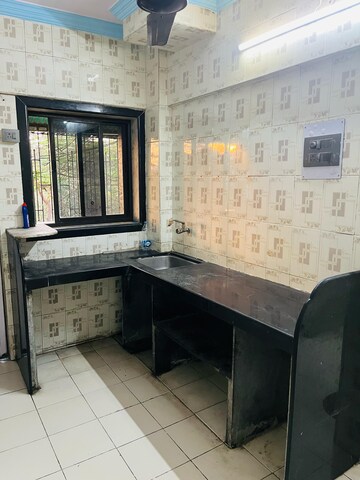 Kitchen in 1 BHK Apartment at Parsik Nagar – for Sale