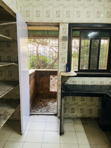 Kitchen in 1 BHK Apartment at Parsik Nagar – for Sale