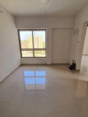 Room in 1 BHK Apartment at Paradigm Ariana Residency, Borivali East – for Sale