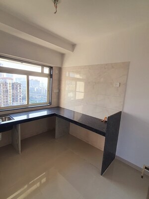 Kitchen in 1 BHK Apartment at Paradigm Ariana Residency, Borivali East – for Sale