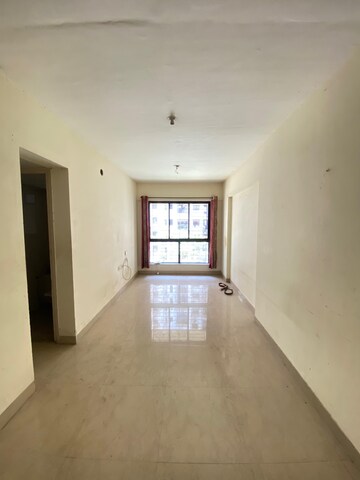 Living Room in 1 BHK Apartment at Lodha Golden Dream, Dombivli East – for Rent