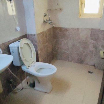 Bathroom in 3 BHK Apartment at Gardenia Golf City, Noida Central – for Rent