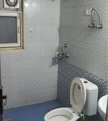 Bathroom in 2 BHK Apartment at Gardenia Golf City, Noida Central – for Rent