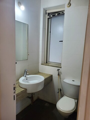 Bathroom in 2 BHK Apartment at Sheth Vasant Lawns, Laxmi Nagar – for Rent
