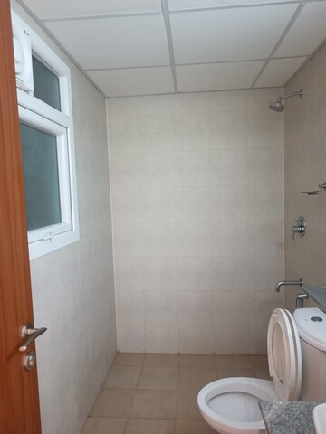 Bathroom in 2.5 BHK Apartment at Bhartiya Nikoo Homes Phase 2, Thanisandra Main Road – for Rent