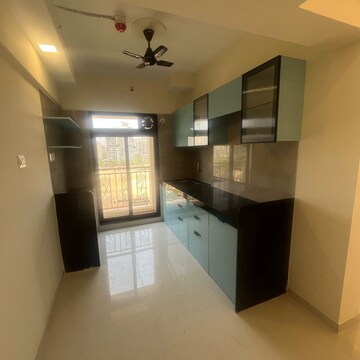 Living Room in 2 BHK Apartment at Harmony Signature Towers, Owale – for Rent
