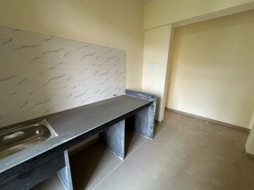 Kitchen in 2 BHK Apartment at Ram Pushpanjali Residency, Owale – for Rent