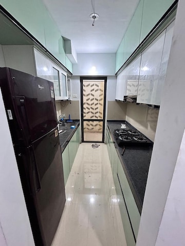 Kitchen in 2 BHK Apartment at Lodha Lakeshore Greens, Dombivli East – for Rent
