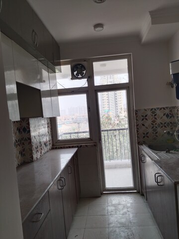 Kitchen in 3 BHK Apartment at Amrapali Leisure Park, Amrapali Leisure Valley – for Rent