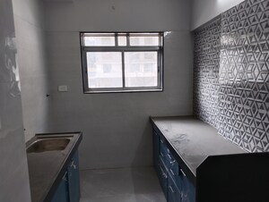 Kitchen in 2 BHK Apartment at Viva Parijat Heights, Nalasopara West – for Sale