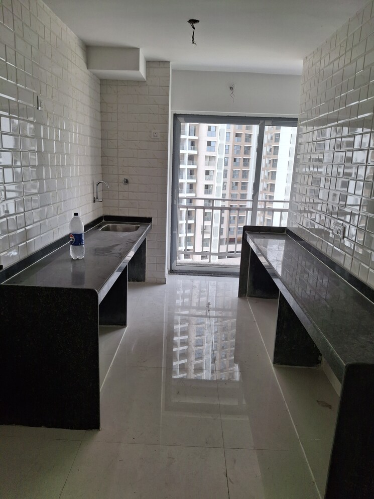 Kitchen, mutha-sai-nirvana 2 Bedroom 1085 Sq.Ft. Apartment In Shahad Thane 8596756