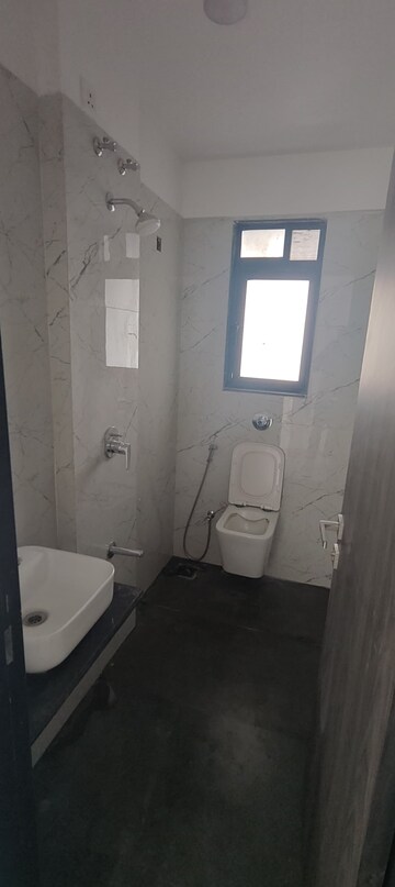 Bathroom in 2 BHK Apartment at Dev Leo Tower, Oshiwara – for Rent