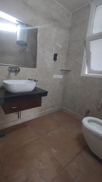 Bathroom in 3 BHK Apartment at RWA Chittaranjan Park Block R, Chittaranjan Park – for Sale
