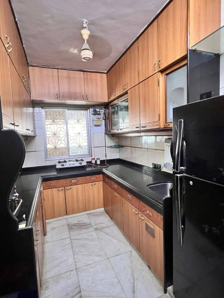 Kitchen, blue-bell-chs-oshiwara 2 Bedroom 735 Sq.Ft. Apartment In Oshiwara Mumbai 8596734