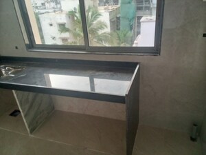 Kitchen in 1 BHK Apartment at Madhu Matrusmruti CHS, Goregaon West – for Sale