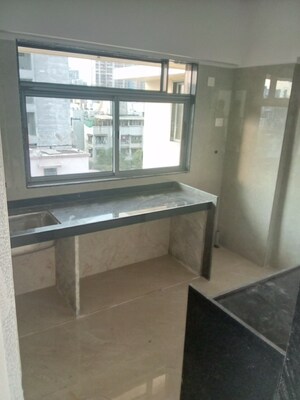 Kitchen in 1 BHK Apartment at Madhu Matrusmruti CHS, Goregaon West – for Sale