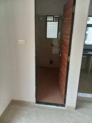 Room in 1 BHK Apartment at Madhu Matrusmruti CHS, Goregaon West – for Sale