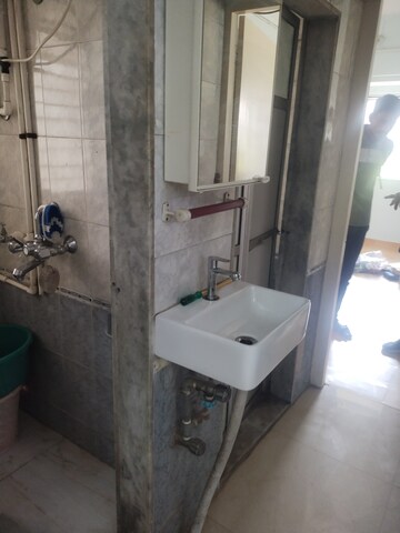 Bathroom in 1.5 BHK Apartment at Jeevan Prakash CHS, Nehru Nagar – for Rent