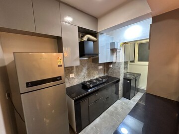 Kitchen in 3 BHK Apartment at Paras Tierea, Sector 137 – for Rent