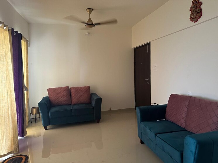 Living Room, puranik-aldea-anexo 2 Bedroom 798 Sq.Ft. Apartment In Baner Pune 8596958