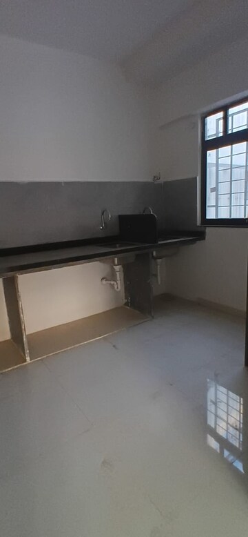 Kitchen in 2 BHK Apartment at Roshan Milestone, Tathawade – for Rent