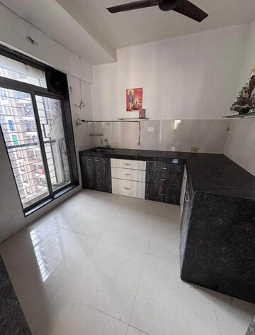 Kitchen in 2.5 BHK Apartment at Runwal Eirene, Balkum Pada – for Rent