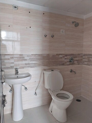 Bathroom in 3 BHK Apartment at Amrapali Zodiac, Sector 120 – for Sale