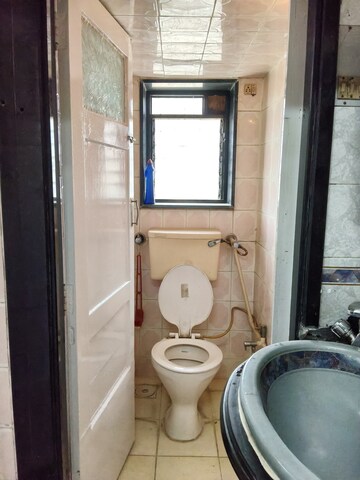 Bathroom in 1 BHK Apartment at Shiv Ganga CHS, Santacruz East – for Rent