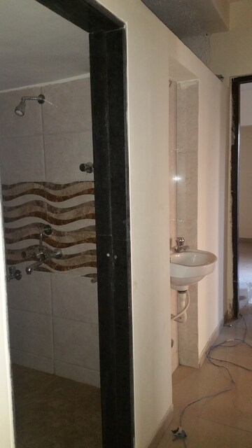 Bathroom in 1 BHK Apartment at Seven Eleven Regency, Mira Road – for Rent
