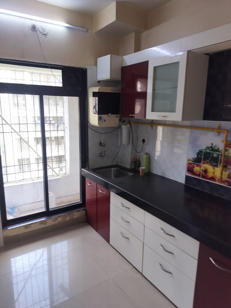 Kitchen, agarwal-and-doshi-complex 1.5 Bedroom 750 Sq.Ft. Apartment In Vasai West Palghar 8597081