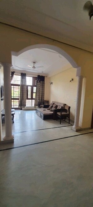 Living Room in 2 BHK Apartment at Amrapali Golf Homes, Sector 4 Greater Noida – for Sale